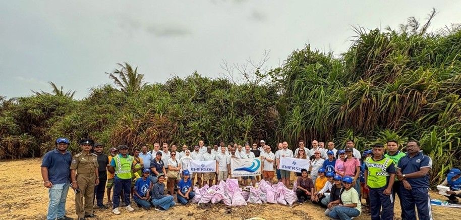 Emerson Leads a Beach Cleanup at Crow Island